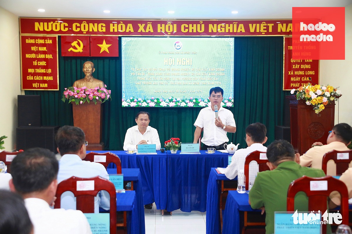 Hội nghị tại xã Hưng Long - Ảnh: NGỌC KHẢI