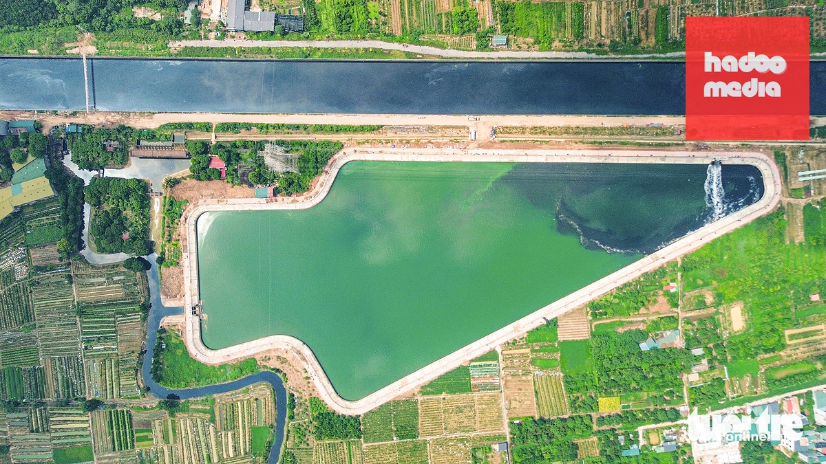 Hồ điều hòa Yên Nghĩa 2 có diện tích khoảng 5ha, tổng mức đầu tư 250 tỉ đồng. Hồ tuy có quy mô nhỏ nhưng đóng vai trò hỗ trợ quan trọng trong việc thoát nước khu vực An Khánh và hành lang đại lộ Thăng Long khi xuất hiện các trận mưa lớn - Ảnh: HỒNG QUANG
