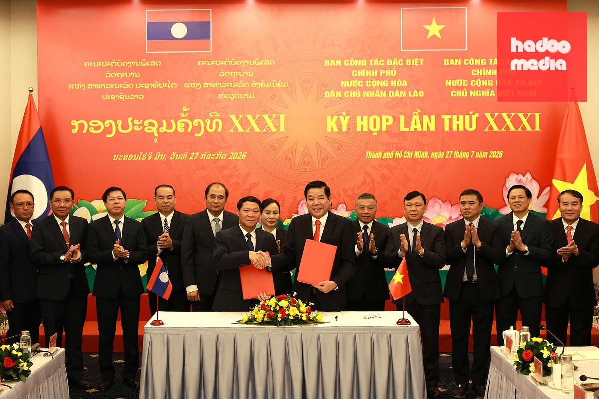 Ban Công tác đặc biệt Chính phủ nước Cộng hòa xã hội chủ nghĩa Việt Nam và Ban Công tác đặc biệt Chính phủ nước Cộng hòa dân chủ nhân dân Lào có ký kết hợp tác trong công tác tìm kiếm, quy tập, hồi hương hài cốt liệt sĩ - Ảnh: LÊ TRẦM