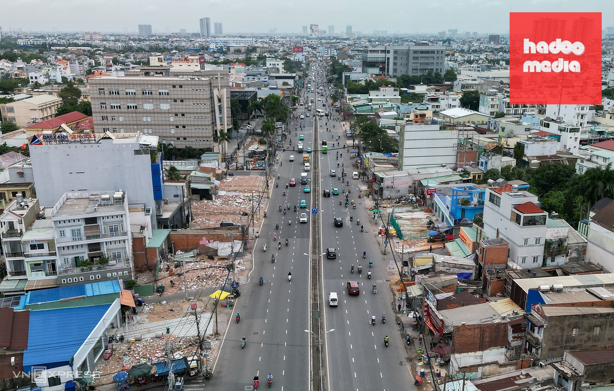 Quốc lộ 13 thông thoáng nhờ nhà cửa lùi sâu trước hạn giao mặt bằng
