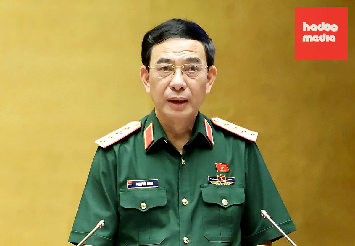 Đại tướng Phan Văn Giang báo cáo giải trình, tiếp thu dự luật - Ảnh: GIA HÂN