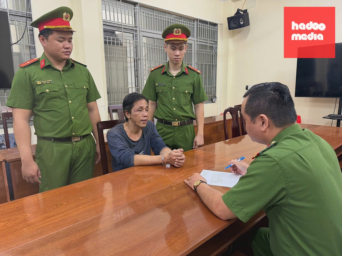Cảnh sát lấy lời khai nghi phạm Trương Xuân Huy. Ảnh: Công an cung cấp