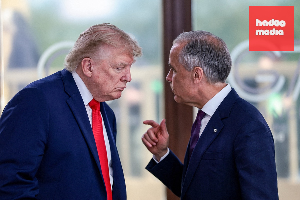 Tổng thống Mỹ Donald Trump (trái) và Thủ tướng Canada Mark Carney trao đổi tại hội nghị thượng đỉnh G7 ở Evian, Pháp ngày 16/6. Ảnh: AFP