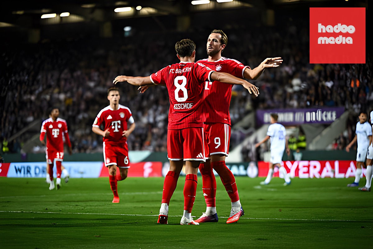 Niềm vui của Kane và Tom Bischof. Ảnh của S. Stingl/FC Bayern - Getty Images.