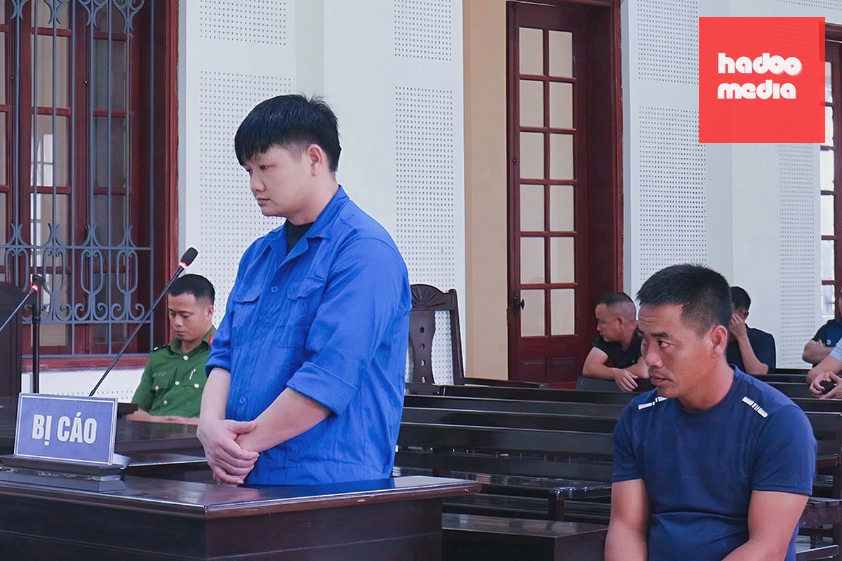 Bị cáo Lương (góc phải) và Đào tại tòa. Ảnh: Hùng Lê