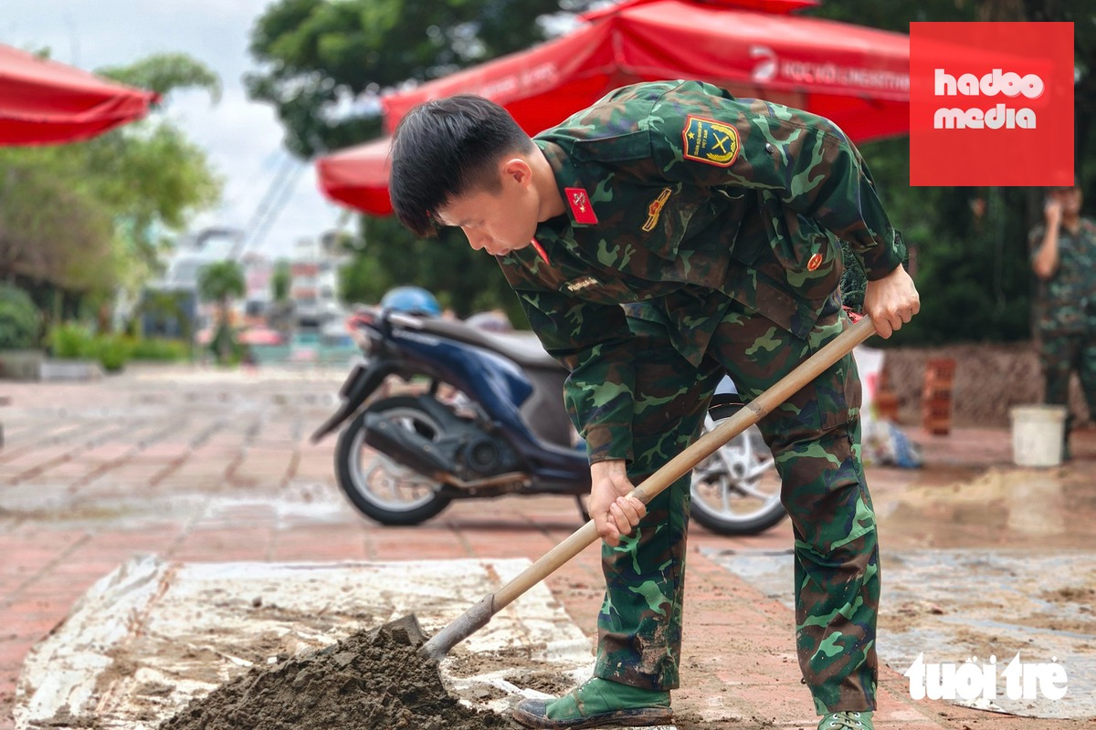Khẩn trương chuẩn bị lễ truy điệu, an táng hài cốt liệt sĩ ở công viên Lê Thị Riêng - Ảnh 7.