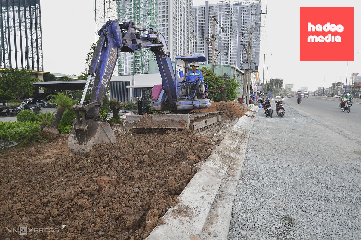 Nhà dân thấp hơn mặt đường quốc lộ cửa ngõ TP HCM sau nâng nền