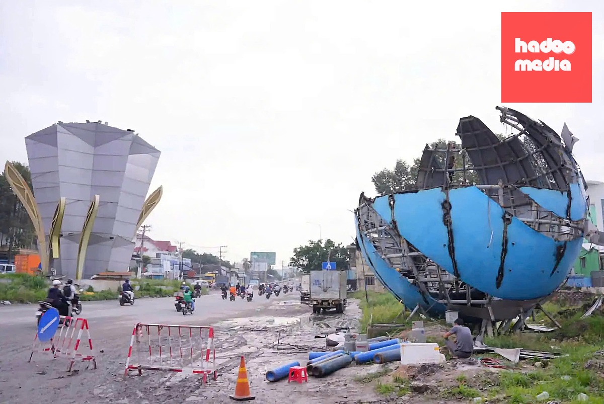 Tháo biểu tượng cổng chào Bình Dương cũ để mở rộng Quốc lộ 13 - Ảnh 3.