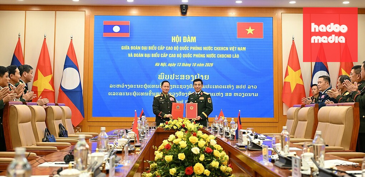 Hai phó Thủ tướng, Bộ trưởng Quốc phòng hai nước ký kế hoạch hợp tác năm 2027. Ảnh: Giang Huy