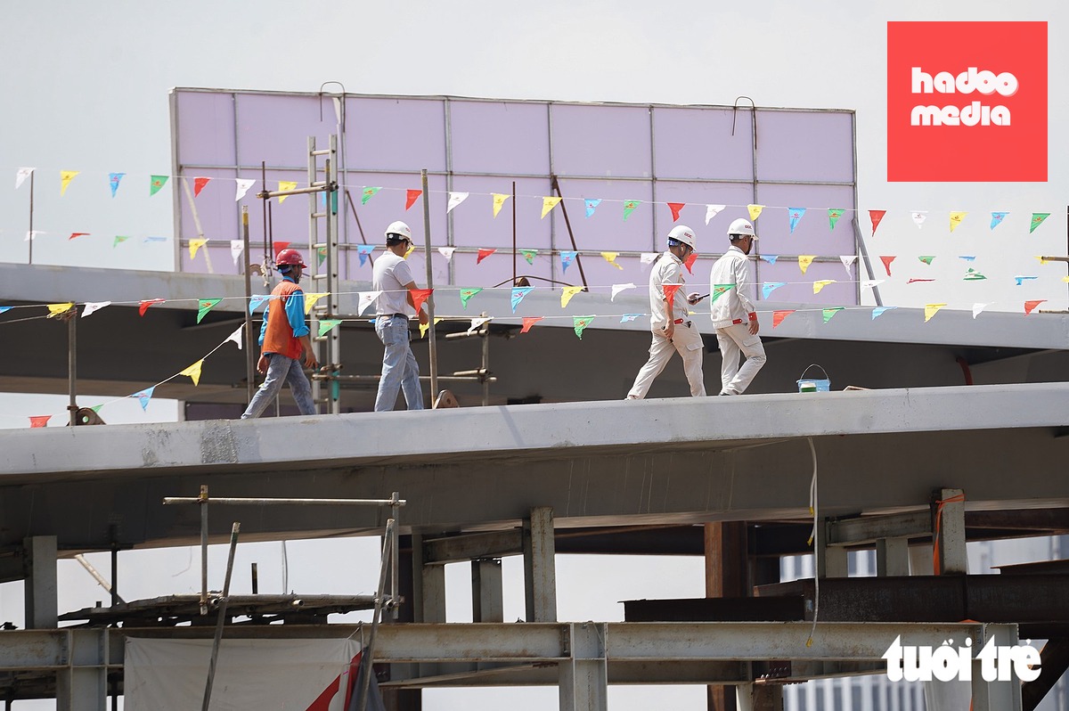 Ngắm công trình cầu đi bộ qua sông Sài Gòn giữa trung tâm TP.HCM chờ lai dắt nhịp chính về hợp long - Ảnh 9.