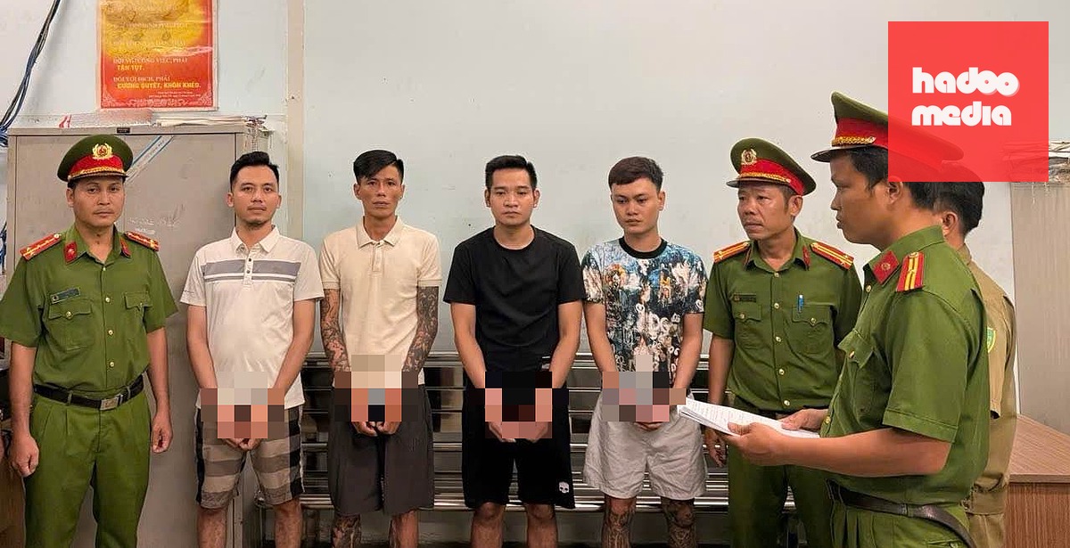 Thi hành lệnh bắt các bị can cho vay lãi nặng bằng hình thức cho vay vàng - Ảnh: Công an TP.HCM