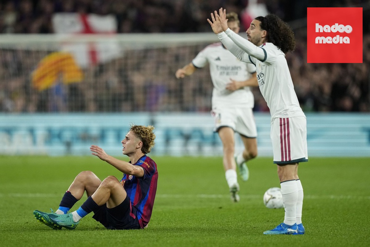 Marc Cucurella – 6.8/10: Khá vất vả trước sự lắt léo của Lamine Yamal nhưng vẫn giữ vị trí kỷ luật, hạn chế tối đa mối nguy hiểm từ cánh này. Ảnh: EPA.

Aurelien Tchouameni – 6.7/10: Làm tròn nhiệm vụ ở khu trung tuyến với tỷ lệ chuyền bóng chính xác lên tới 96% (44/46 đường chuyền), giúp che chắn hiệu quả cho hàng thủ. Ảnh: EPA.

Bernardo Silva – 6.4/10: Tích cực phòng ngự từ xa, cầm nhịp và thoát pressing trong bối cảnh Real giữ ít bóng, thi đấu bền bỉ đến phút 80. Ảnh: EPA.

Arda Guler – 7/10: Mối đe dọa thường trực bên cánh phải với 5 cú sút (3 lần trúng đích), chỉ thiếu một chút sắc bén để có bàn thắng. Ảnh: EPA.

Jude Bellingham – 7.2/10: Gây ấn tượng ở khối lượng vận động và phong tỏa nhạc trưởng Rodri của Barca nhiều hơn là khâu tấn công; bỏ lỡ một cơ hội dứt điểm ở phút 78. Ảnh: EPA.

Yan Diomande – 7/10: Chăm chỉ hỗ trợ phòng ngự bên cánh trái, có một nỗ lực phản công nguy hiểm cuối hiệp một trước khi rời sân nhường chỗ cho Carlos Espi. Ảnh: EPA.

Kylian Mbappe – 8.3/10 (Cầu thủ xuất sắc nhất trận): Ngôi sao người Pháp định đoạt trận Siêu kinh điển với cú đúp (phút 41 và 87), chính thức chạm mốc 100 bàn thắng trong màu áo Real Madrid.